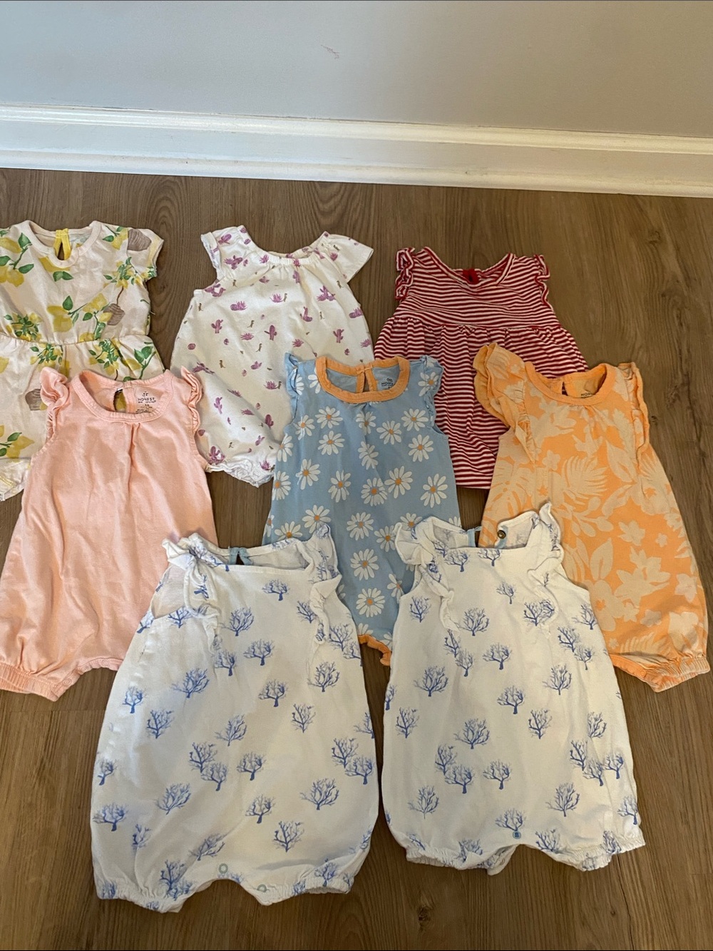 Mixed lot Burt’s Bees Baby and Honest Company rompers